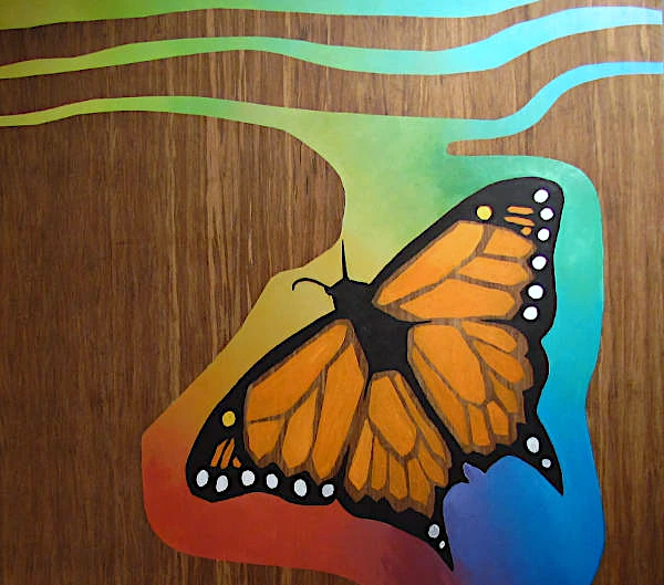 Painting of butterfly in acrylic colours on strand woven bamboo panel